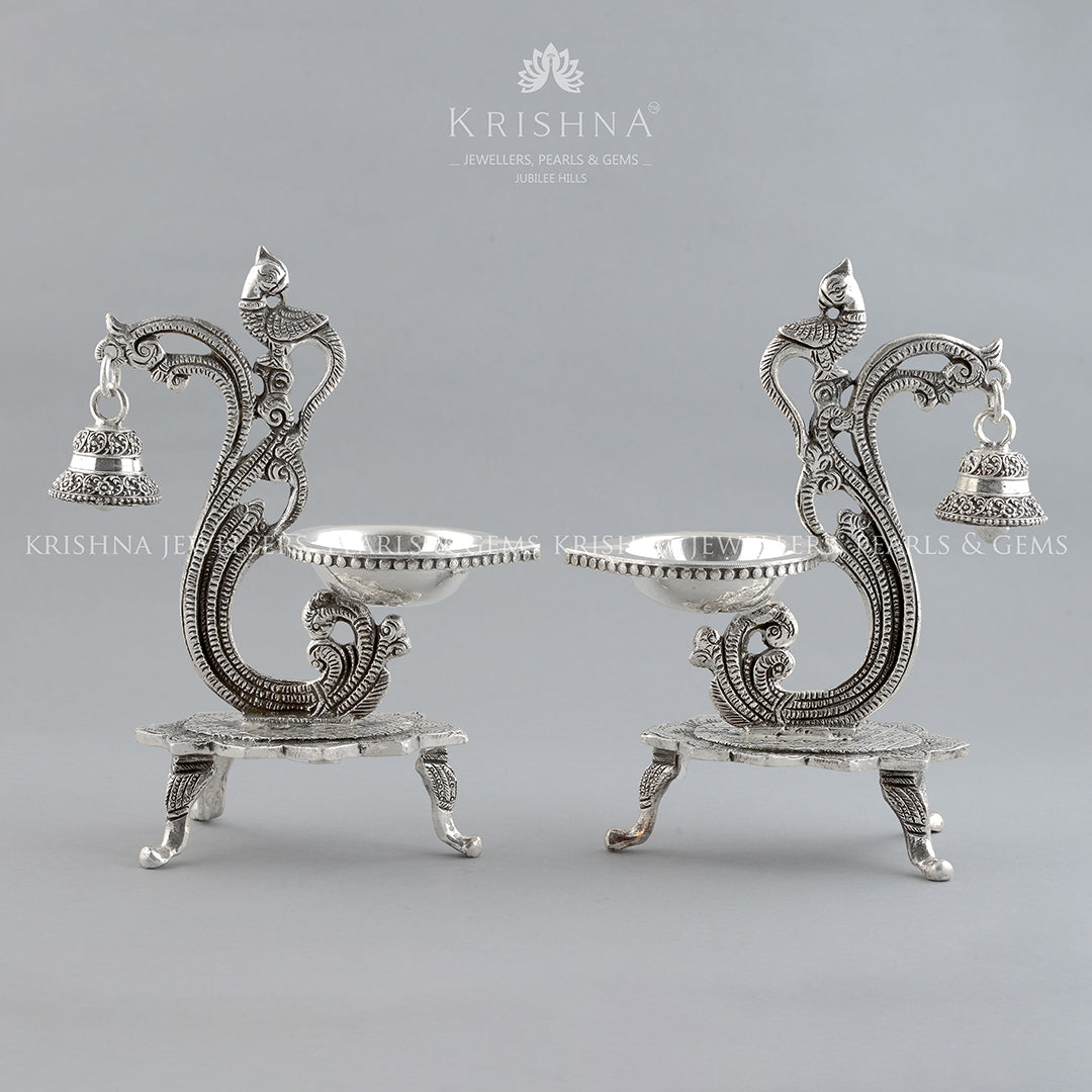 Silver Peacock Deepam Stand with Hanging Bell - Krishna Jewellers Pearls and Gems