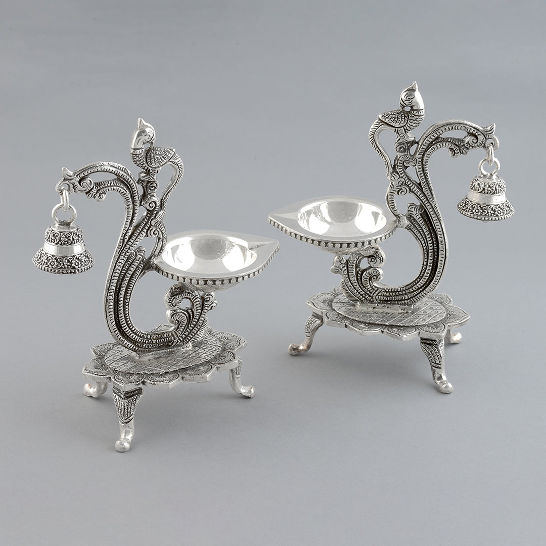 Silver Peacock Deepam Stand with Hanging Bell - Krishna Jewellers Pearls and Gems