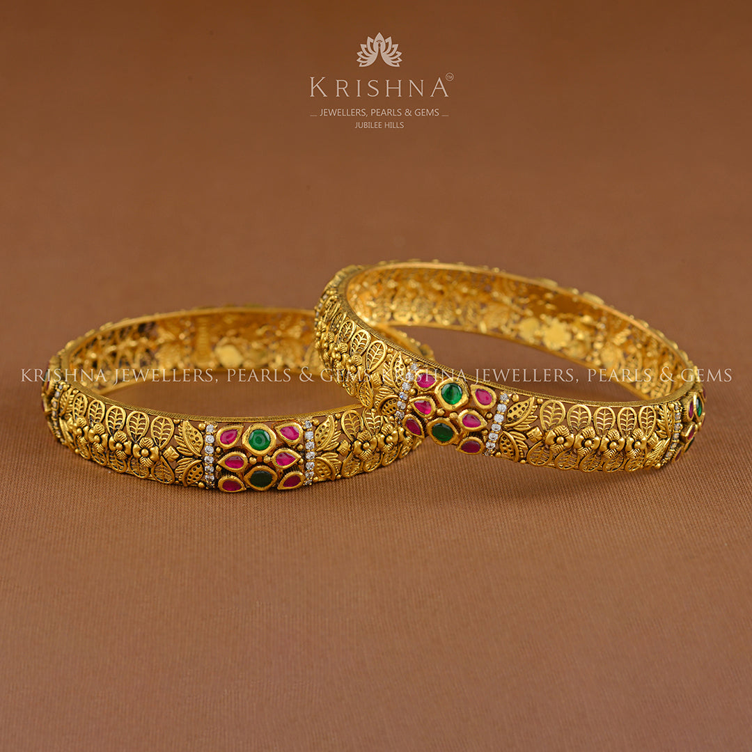 Floral Gold Bangles in Antique Finish - Krishna Jewellers Pearls and Gems