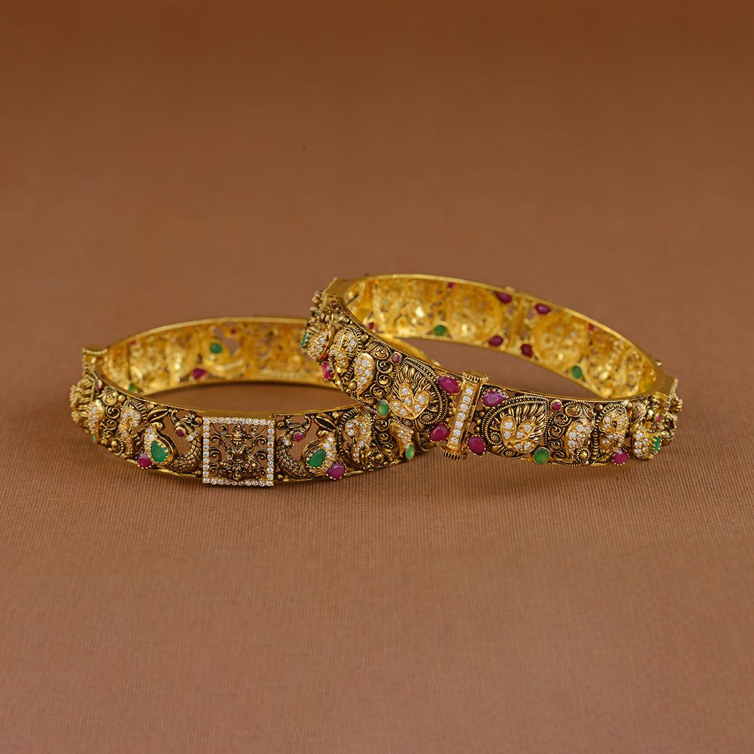 22k Gold Laxmi and Peacock Design Bangles - Krishna Jewellers Pearls and Gems