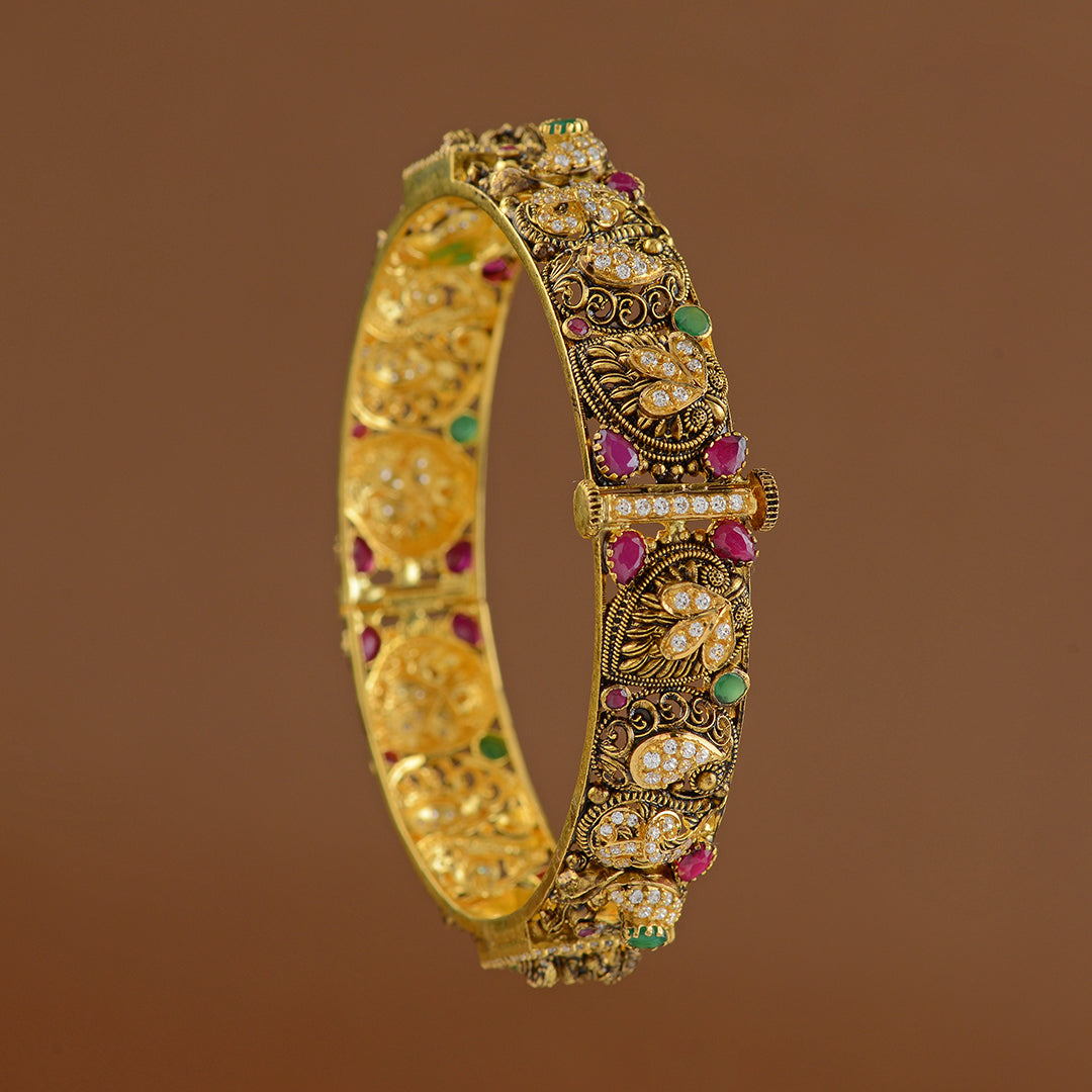 22k Gold Laxmi and Peacock Design Bangles - Krishna Jewellers Pearls and Gems