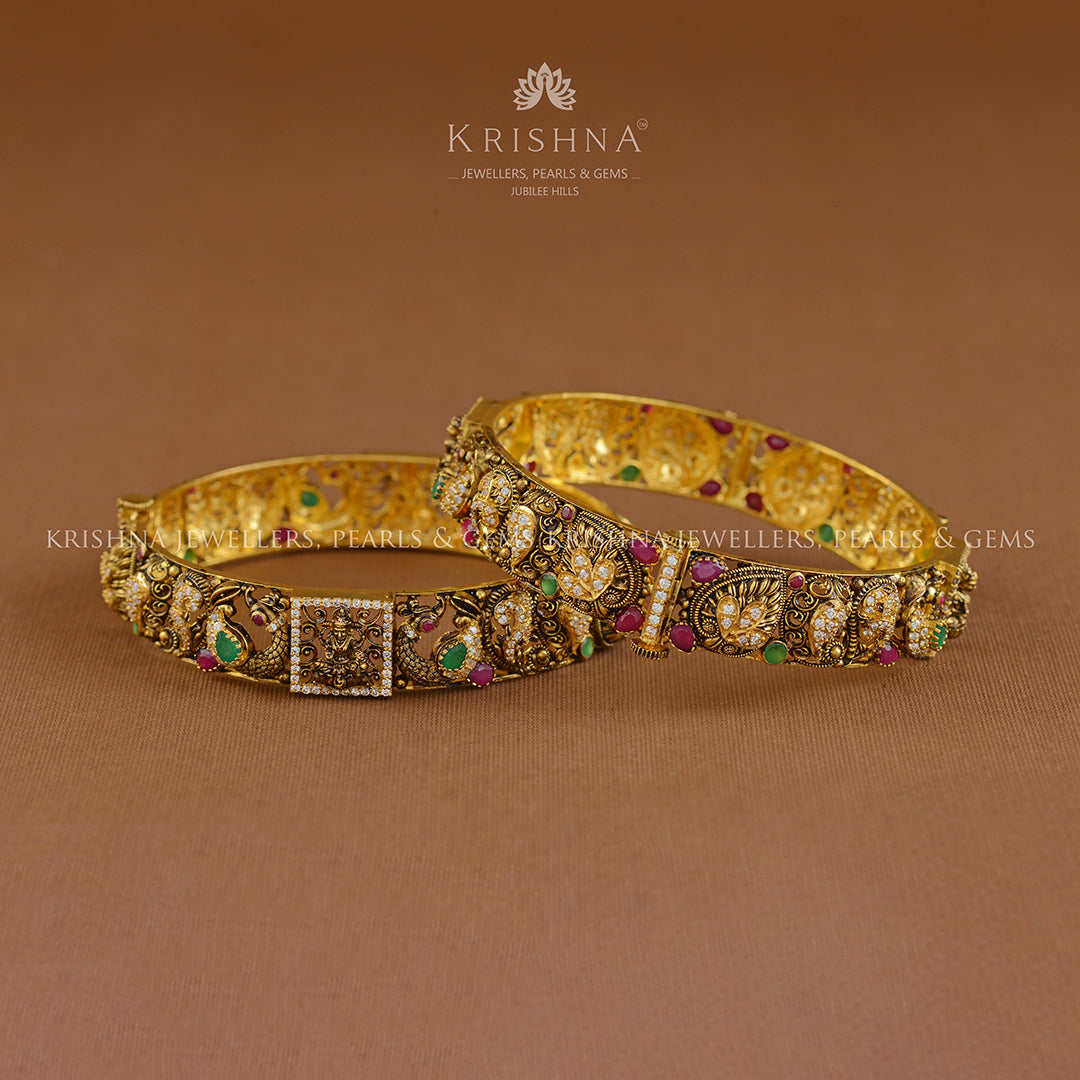 22k Gold Laxmi and Peacock Design Bangles - Krishna Jewellers Pearls and Gems