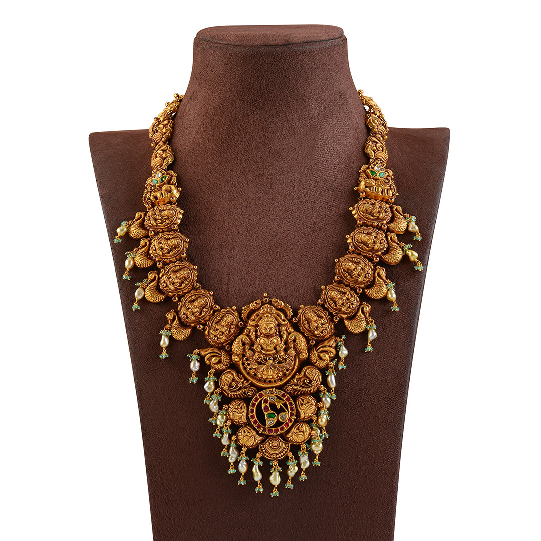 Nakshi Gold Long Haram in Lakshmi and Peacock Work โ Krishna