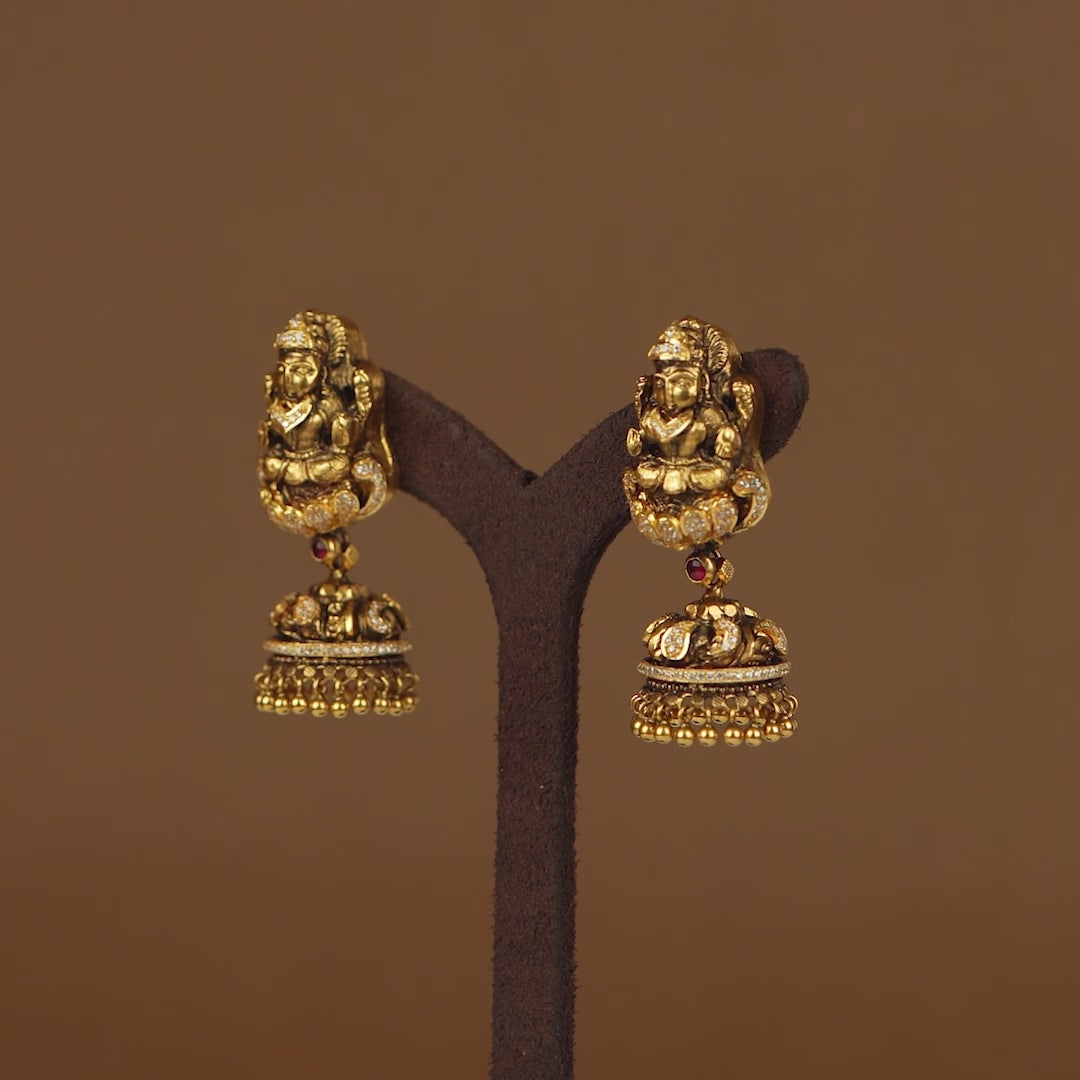 Gold Jhumka Style Laxmi Themed Earrings